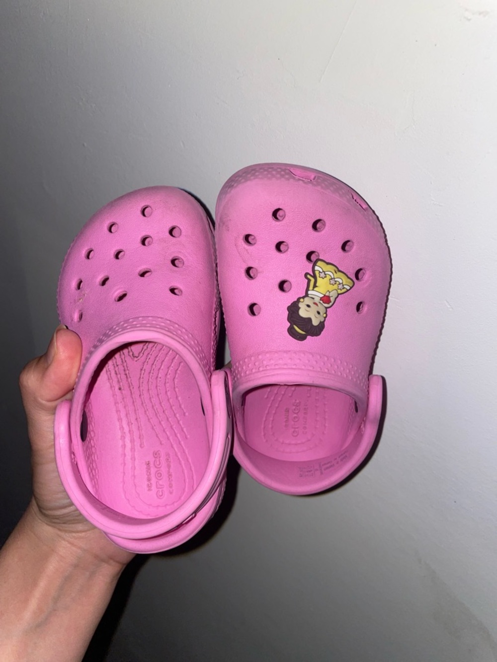 CROCS Kids Pink Slip-On Clogs with Character Charm